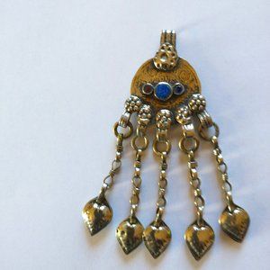 Middle Eastern silver tone coin pendant